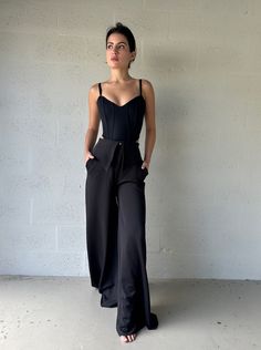 This garment was customized and tailored specifically for Theme Dresser. Elevate your style with our black lapel wide pants. These sophisticated trousers feature a sleek black lapel and a wide leg design, providing a luxurious and exclusive look. Perfect for any occasion, these pants will become a staple in your wardrobe. Dress to impress with our black lapel wide pants. Model is wearing size small. Pants Model, Dress Idea, Corset Bra, Jewelry Essentials, Vacation Mode, Wide Leg Pant, Linen Shop, Leg Design, Wide Pants