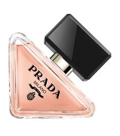 Often times the most memorable scents don’t require much, and with Prada’s Paradoxe eau de parfum, three notes are enough to create its warm aroma. Building its foundation with a new musk molecule for a base layer of depth, the fragrance features spicy amber accords at its heart and blossoming neroli for a citrusy yet floral twist. This complex perfume is encapsulated in a triangular bottle, resembling the House’s iconic logo and nodding at its rich Milanese heritage. Prada Perfume, Prada Candy, Feminine Fragrance, Long Lasting Perfume, Signature Fragrance, Dior Addict, Miuccia Prada, Raf Simons