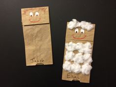 two paper bags that have been made to look like sheep