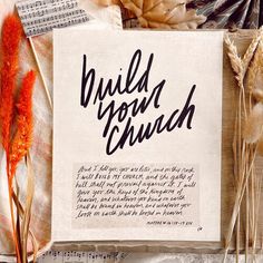 an old paper with the words build your church written on it next to dried flowers