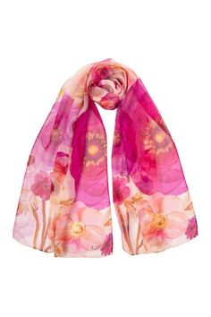 Named after the famous piazza in Rome, Campo de' Fiori (field of flowers), this sheer silk Georgette long scarf has a floral print. 100% Made in Como, Italy. Figure flattering size: Approx. 20” x 67". Years of trial and error taught us that this size scarf is one of the simplest to style and makes every woman look chic. 100% Silk Georgette: A lightweight, sheer crepe-style fabric characterized by its crinkly, pebbly texture and excellent drape that is often used in high-end fashion. It has a dul Pink Floral Print Feminine Scarves, Pink Feminine Floral Print Scarves, Feminine Pink Floral Print Scarves, Silk Floral Print Scarves For Summer, Silk Scarves With Floral Print For Spring, Pink Floral Print Silk Scarves, Pink Silk Scarf With Floral Print, Pink Floral Print Scarves For Spring, Pink Floral Print Scarf For Spring