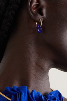 Mateo's modern art influences are clear to see in the sculptural shape of the brand's 'Donut' earrings. Handmade in New York, they feature removable lapis lazuli rings looped onto 14-karat gold hoops, which have been polished to a high shine. Style them with other pieces from the label. Modern Blue Hoop Jewelry, Contemporary Pierced Hoop Jewelry, Contemporary Single Hoop Earring, Contemporary Single Round Earring, Gold Donuts, Donut Earrings, Turquoise Hoop Earrings, Turquoise Hoops, Lapis Lazuli Earrings