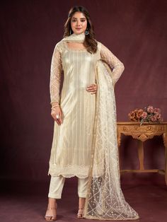 Presenting an exquisite off-white net kameez adorned with intricate threadwork, sequin detailing, and a fancy readymade lace border for an elegant touch. Paired seamlessly with a crepe salwar in a matching off-white shade, this ensemble exudes timeless sophistication and style.
Completing the look is a net dupatta in a similar off-white color, featuring sequin work, thread embroidery, and a fancy lace border. The 2.5-meter-long dupatta adds a graceful layer to the outfit, enhancing its overall a Butterfly Net, Lehenga Gown, Fabric Butterfly, Silk Bottoms, Embroidered Butterfly, Net Dupatta, Thread Embroidery, Salwar Suit, Hip Dress