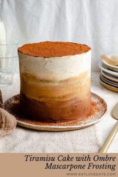 a cake with ombretta and mascarpone frosting sitting on a plate