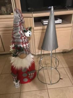 a christmas decoration is sitting on the kitchen floor