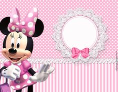 a minnie mouse with pink and white polka dots on it's face, standing in front of a frame