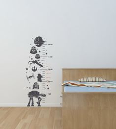 the star wars growth chart wall decal is shown in this child's room