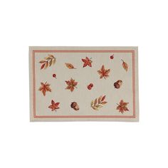 a place mat with leaves and acorns on it