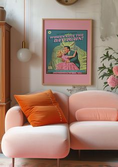 a pink couch sitting in front of a clock on the wall next to a vase with flowers