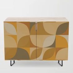 a cabinet with an abstract design painted on it