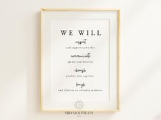 a white framed poster with the words we will in black and white lettering on it