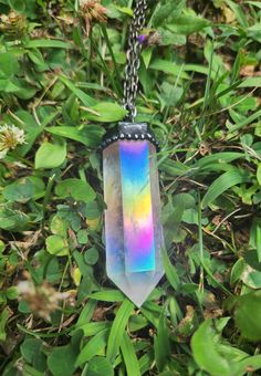 Chunky Clear Quartz Tower Pendant Necklace with Titanium Colorful Rainbow Coating - Real Crystal Soldered Pendant  Total Weight (with necklace): 33g Chain Length: 24-27 inches Pendant Height: 52mm Nickel-free Multicolor Crystal Necklaces, Multicolor Nickel-free Crystal Necklaces For Jewelry Making, Iridescent Crystal Pendant For Jewelry Making, Iridescent Crystal Pendant Necklace For Jewelry Making, Multicolor Nickel-free Crystal Necklace As Gift, Multicolor Nickel Free Necklace For Healing, Nickel-free Multicolor Crystal Necklace Gift, Unique Multicolor Pendant Crystal Necklace, Unique Multicolor Crystal Pendant Necklace