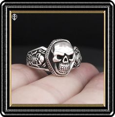 "Material is .925 Sterling Silver Ring Sizes Are 9 to 12-US. Half sizes are available so convo us! Triple Skull Biker Ring. Made in Sterling Silver with a good goth design in mind. Nice details throughout the design. Many have asked for lower priced items so here you go. We will try to have more medium weight pieces as time permits. Enjoy. Casting by Rainbow. \"We Do Not\" ship to Thailand. Export Only! Thanks." Gothic Hallmarked Rings For Collectors, Silver Skull Ring For Biker Events And Halloween, Vintage Skull Ring For Halloween Collectible, Collectible Gothic Skull Ring, Gothic Skull Rings For Collectors, Gothic Skull Collectible Rings, Biker Jewelry For Halloween Gift, Biker Style Jewelry For Halloween Gift, Biker Style Halloween Jewelry Gift