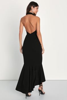 Effortlessly accept compliments and admiring glances in the Lulus Elegant Grace Black Tiered Halter High-Low Maxi Dress! Keep things classy in this stretchy crepe knit dress that features a high, halter neckline and a darted bodice with supportive side boning. High, fitted waist sits atop a figure-flaunting midi skirt that falls to a tiered, high-low maxi hem. Turn around to reveal the sexy open back design that secures with dual, top button-loops. Hidden back zipper/clasp. Fit: This garment fit Elegant Stretch Backless Dress In Elastane, Elegant Bodycon Elastane Backless Dress, Chic Midi Dress With Mermaid Hem For Night Out, Chic Stretch Midi Dress With Mermaid Hem, Chic Mermaid Hem Midi Dress For Date Night, Black Elastane Evening Dress, Chic Stretch Dress With Mermaid Hem, Elegant Elastane Backless Party Dress, Elegant Elastane Backless Dress For Party