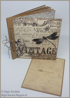 an old fashioned greeting card with dragonflys on the front and back, is shown