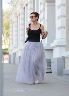 "The skirt is made of four layers of tulle and lining in a similar color Length (without belt) 1m / 39.3 inches Long tulle skirts for women Perfect for a wedding, party or your punk vision Every bridesmaid will look great with tutu skirt Fairy full skirt is wonderful The elastic waistband is always BLACK. Regardless of the skirt color. If you want to change black elastic tape with white, please email us. HEIGHT OF MODEL: 168 cm. / 5′ 6″ Size S All garments are handmade. Please provide your PHONE Long Tulle Skirts, Maxi Tulle Skirt, Bridesmaid Skirt, Bridesmaid Skirts, Tulle Long Skirt, Fluffy Skirt, Tulle Maxi Skirt, Fairy Skirt, Tulle Skirts