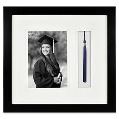 a black and white photo with a blue tassel