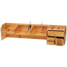 a wooden bench with drawers and scissors on it's sides, in front of a white background