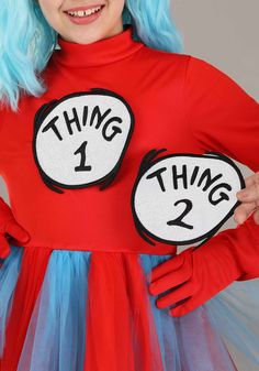 a woman with blue hair wearing a thing 1 thing costume