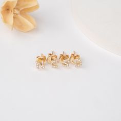 Shonda Elevate your look with a touch of timeless personalization. These exquisite 18k gold stud earrings, available in your choice of classic yellow, elegant white, or romantic rose gold, showcase your chosen initial meticulously crafted in a delicate script. Each initial shimmers with sparkling natural diamonds, adding a touch of luxury to your everyday style or a special occasion. - Handmade- Solid Gold- Natural Diamonds - G Color, SI Quality Diamonds- Total Diamond Carat Weight (for pair): 0 14k Yellow Gold Earrings With Initials, Classic Personalized 14k Gold Earrings, Elegant Gold Earrings With Initials, Minimalist Yellow Gold Initials Earrings, Personalized Elegant Rose Gold Earrings, Elegant Personalized Rose Gold Earrings, Elegant Sterling Silver Initial Earrings, Elegant Personalized White Gold Earrings, Gold Diamond Stud Earrings