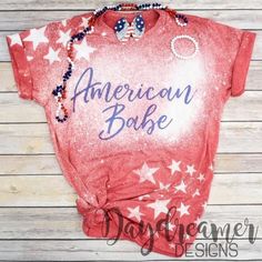 Bold stripes, bright stars, and brave hearts! #flag #free #freedom #merica #america #4thofjuly #graphictees #usa #sparkle #fireworks #daydreamerdesigns #photo #earrings #jewelry #accessories #custom #handmade #boutique #wholesale #smallbusiness #womanownedbusiness #shopsmall #babessupportingbabes #instagood #1776 #madeinamerica #letfreedomring #independenceday #americanbabe #texas Bleach Shirt Diy, Bleached Tees, Babe T Shirt, Bleach Tie Dye, Cute Shirt Designs, Tshirt Ideas, Vinyl Shirts, Custom Tees, Diy Shirt