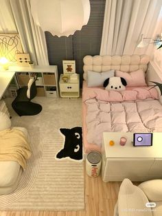 a small bedroom with a bed, desk, and chair in it's corner