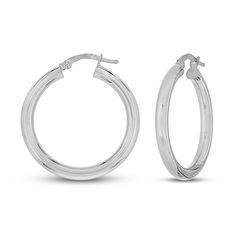 Lustrous hoops of high polish gold come together to form these elegant women's hoop earrings. Crafted in 14K white gold, the earrings secure in place with snap-lock backs. Earring height is 20mm. White Gold Hypoallergenic Hoop Earrings For Anniversary, Classic Silver Huggie Earrings, Modern Hallmarked Round Hoop Earrings, Classic Small Hoop Hinged Earrings, Anniversary White Gold Hypoallergenic Hoop Earrings, White Gold Huggie Hoop Earrings With Polished Finish, Elegant Round Hinged Huggie Earrings, Modern Round Hallmarked Hoop Earrings, Small Hoop Hinged Huggie Earrings For Anniversary