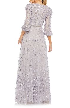 Three-dimensional blooms adorn this floor-grazing gown made with a soft mesh overlay on top of sweet lace that brings romance to your party-ready look. 61" length Back zip closure Jewel neck Three-quarter sleeves Partially lined 100% polyester Spot clean Imported Asian Owned/Founded Evening Gown With Floral Applique In Tulle, Evening Gown With Floral Applique And Tulle, Evening Tulle Gown With Floral Applique, Elegant Gown With Floral Applique And Lace, Lace Evening Dress With Floral Applique For Gala, Gala Lace Evening Dress With Floral Applique, Gala Evening Dress With Floral Applique Lace, Scalloped Lace Gown For Gala And Prom Season, Scalloped Lace Gown For Gala During Prom Season