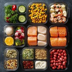 several plastic containers filled with different types of food