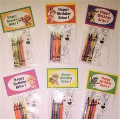 four happy birthday coloring books and pencils in plastic bags