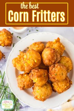 the best corn fritters on a white plate