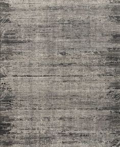 an area rug with grey and black colors