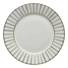 a white and gold plate with stripes on the rim is shown against a white background