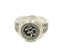 This ring was designed with the Om Ohm symbol. Symbol of oneness in Hinduism and other world religions.  As seized in the West, the Om symbol marks content dealing with yoga, spirituality, and the feelings of inner peace. The beautiful pewter ring is a silver color and the background is blackened to bring out the fine detail of the design. Our rings are 100% Lead and nickel free pewter and made in the USA The top design part of the ring measures about 15 mm in diameter The ring band tapers from Atheist Symbol, Yoga Spirituality, Ohm Symbol, Pewter Ring, Other World, Fake Jewelry, Om Symbol, World Religions, Star Ring