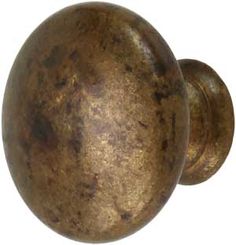 an antique brass door knob on a white background