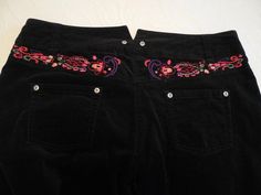 OILILY Black Cotton Elastane Embroidered Jeans Pants - 42 - 8 to 10 - NWT   New with a partial tag is a pair of black cotton blend embroidered jean cut pants from OILILY in a size 42 or US size 8 to 10. Fabric is 98% cotton and 2% elastane -- kind of a velveteen feel to them. Measurements laid flat are: waist --- 16 3/4" rise --- 9 1/2" hips --- 21" inseam --- 33 3/4"  length --- 43"  Please email me if you have any questions and I am always happy to combine on shipping. Thanks for looking! PLEA Black Embroidered Cotton Pants, Black Embroidered Straight Leg Pants, Embroidered Stretch Straight Leg Bottoms, Stretch Cotton Embroidered Pants, Embroidered Jeans, Jeans Pants, Black Cotton, Casual Shorts, Cotton Blend