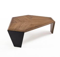 a wooden table with black metal legs and a triangular design on the top, against a white background