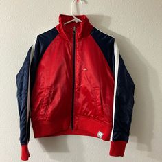 So Gorgeous, What A Find! Perfect Condition, Brand New Dead Stock From 2003! Please See Photos And Ask Any Questions! Underarm To Underarm: 21” Top Of Shoulder To Cuff: 29” Back Neck Seam To Bottom: 21.5” Red Outerwear For Sports In Fall, Casual Red Winter Track Jacket, Red Long Sleeve Track Jacket For Spring, Red Long Sleeve Spring Track Jacket, Sporty University Red Outerwear For Fall, Red Hooded Track Jacket For Fall, Nike Vintage Long Sleeve Outerwear, Retro Red Sports Outerwear, Vintage Red Sports Outerwear