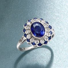 Ross-Simons - C. 1990 Vintage 2.10ct t. w. Sapphire, .50ct t. w. Diamond Floral Ring Oval Cut Size 7. C. 1990. The deep blue hues of this floral ring from our Estate collection will bring a calm sophistication to your ensemble. A central 1.70 carat oval sapphire is haloed by dazzling petals of .50 ct. t. w. round brilliant-cut diamonds. A second halo of .40 ct. t. w. kite-shaped sapphires adds another dimension of oceanic shimmer. Crafted in 18kt white gold with milgrain details. 1/2" wide. Diam Classic Blue Halo Ring, Classic Platinum Sapphire Ring, Classic Sapphire Ring With 17 Jewels, Vintage Gia Certified Sapphire Jewelry, Classic Sapphire Ring With 17 Jewels In Platinum, Collectible Sapphire Ring With Center Stone In Platinum, Classic Sapphire Diamond Cluster Ring, Vintage Blue Cluster Ring With Brilliant Cut, Vintage Blue Brilliant Cut Cluster Ring