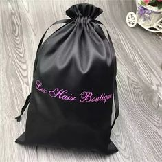 "These satin favor bags are sure to impress your guests at your next big event. These bags are available in 3\" x 5\" , 4\" x 6\",5x7\",6x8\",8x10\",10x12\" and are made from high quality satin fabric with a satin drawstring. Use them to elegantly package items such as wedding favors, jewelry, gifts, and more. Dimensions are approximate. Satin bags are available in WHITE/BLACK colors We custom all sizes ! Dust proof bag, 2 size for choosing: 20x16 inches 22x20 inches custom SIzes are welcome . C Rectangular Satin Wedding Bag, Satin Pouch Bag For Gift, Hair Bags, Wedding Favor Gift Bags, Hair Boutique, Satin Bags, Drawstring Bags, Party Favor Bags, Favor Bags