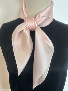 "Luxurious light Sakura pink natural mulberry silk medium square scarf, size: 65 cm x 65 cm / 26 in x 26 in. Soft, smooth, and lustrous silk charmeuse fabric, breathable and skin-friendly feels very soft and comfortable to wear. Can wear it on both sides which will give different feel and look. Can style in many ways: can wear this scarf as a soft neck scarf, as a hair tie, as a headband scarf, as a wrist scarf, as a purse accessory. Or style it in any way you want with your own sense of creativity! Suitable for all seasons and is a great gift idea for special occasions.  Care Instructions: Pure silk is a type of organic, natural and delicate fabric, please avoid washing if it's not particularly dirty. Gently hand wash cold/lukewarm with mild detergent, natural air dry. Stored in a cool, d Baby Pink Silk, Pink Silk Scarf, Headband Scarf, Plain Scarves, Charmeuse Fabric, Silk Neck Scarf, Scarf Hair, Small Scarf, Hair Scarf