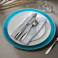 a plate with silverware on top of it