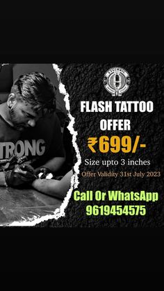 a man sitting at a table with a tattoo on his arm and the words flash tattoo offer