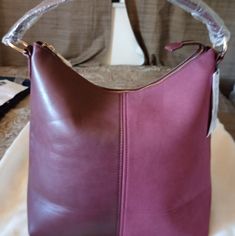 This Is A Beautiful Pre-Owned Handbag That Is In Great Condition This Bag Has A Single Strap, Zip Closure, Two Open And One Zip Pocket Interior. 12 X13 X 5 Purple Soft Leather Shopping Bag, Purple Leather Rectangular Hobo Bag, Burgundy Hobo Bag With Zipper For Daily Use, Burgundy Hobo Bag With Zipper Closure For Daily Use, Burgundy Hobo Bag With Zipper For Everyday Use, Burgundy Hobo Bag With Zipper Closure, Everyday Burgundy Hobo Bag With Zipper Closure, Purple Shoulder Bag With Zipper Closure For Errands, Hobo Style