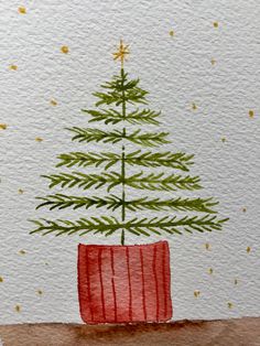 a watercolor painting of a christmas tree in a red pot with gold stars on it