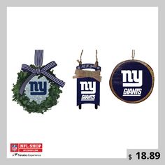 new york giants christmas ornament set with wreath and football ball hanging from it's side