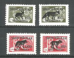 three different stamps with animals on them