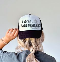 Local Egg Dealer Hat for Chicken Lover Local Egg Dealer Trucker Hat Farm Girl Cap Funny Snapback Country Girl Farmer Hat Adjustable Chick This Egg Dealer Trucker Hat stands out for its playful yet practical design, serving as a humorous nod to the world of chicken farming and egg selling. With its adjustable snapback feature, it offers a comfortable fit for both chicken moms and dads alike, making it a versatile accessory for anyone involved in the farming community. Whether you're actually runn Cute Flat Brim Hat One Size, Cute Brimmed Trucker Hat, One Size Fits Most, Cute Brimmed Trucker Hat, Cute Brimmed Trucker Hat One Size Fits Most, Letter Print Hat With Short Brim, Black Hats For Spring Gifts, Black Hat For Spring Gift, Black Hats As Spring Gifts, Spring Brimmed Hat With Letter Print