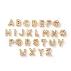 the letters and numbers are made out of gold colored metal with diamonds on them,