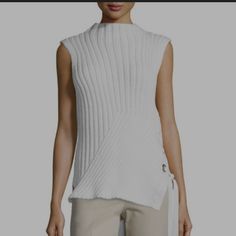 Derek Lam 10 Crosby Sleeveless Ribbed- Knit Sweater. Size S/P. Cream Color. Lace Up Left With Grommet Detail. Never Worn. No Holes Or Frays. Should Dry Clean. Smell Like Perfume To Be In A Box. Chic Sleeveless Cable Knit Top, Sleeveless Cable Knit Vest For Spring, Sleeveless Cable Knit Sweater Vest For Layering, Casual Sleeveless Cable Knit Top, Sleeveless Cable Knit Top For Layering, Elegant Sleeveless Knit Sweater, Sleeveless Cable Knit Top For Fall, Chic Sleeveless Knit Sweater, Spring Cable Knit Sleeveless Sweater Vest